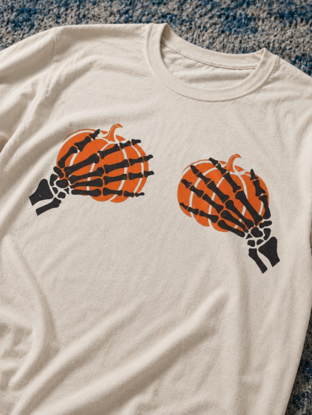 Off-White Tee with Orange Pumpkins and Black Skeleton Hands | Unisex T Shirt